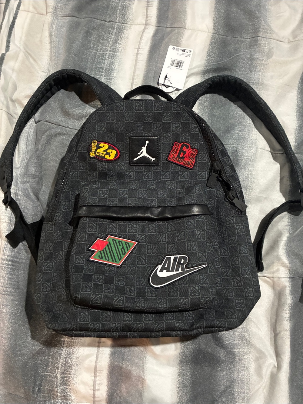 Jordan Black Backpack with Multicolor Patch Accents